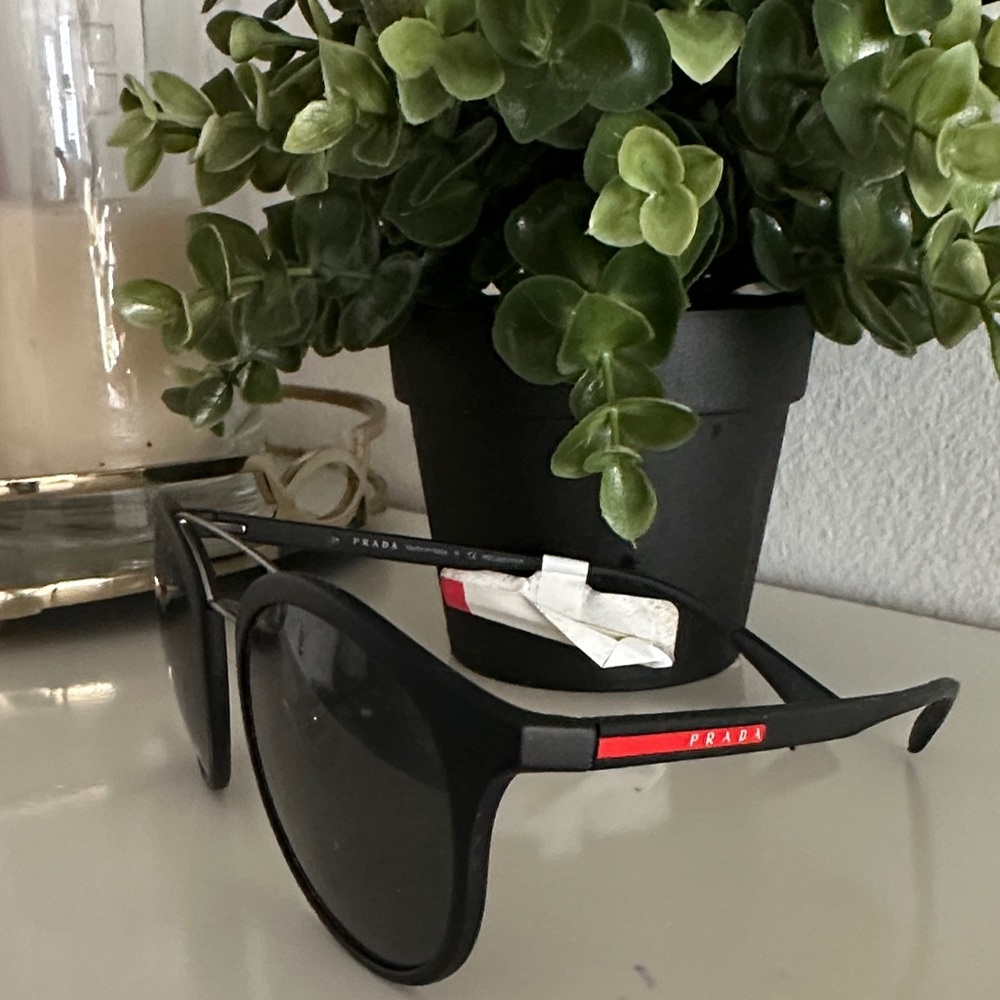 Prada Black Sunglasses with Red Accent